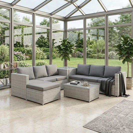 A Light Grey Outdoor Rattan Garden Furniture Set located outdoors