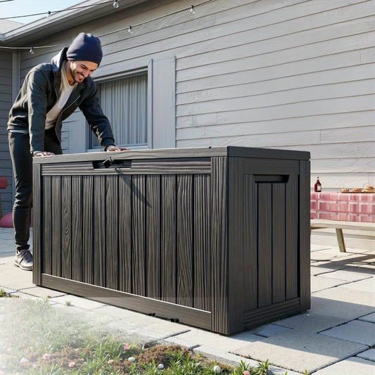 Person interacting with a large outdoor storage box with imitation wood grain finish.
