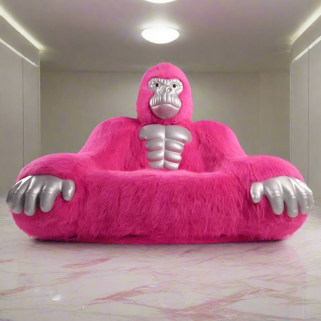 A pink inflatable gorilla sofa sold by WorkZen Interiors
