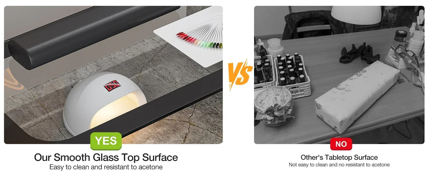 The glass top surface of a grey marble L shaped manicure table sold by WorkZen Interiors