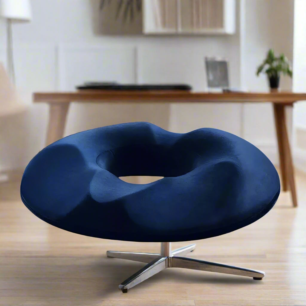 A navy blue memory foam chair cushion kept in the office 