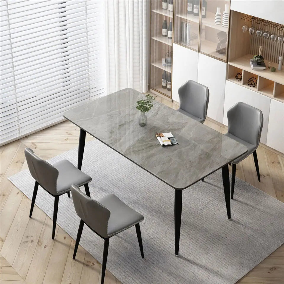A rectangular marble cafeteria table and 4 chairs sold by WorkZen Interiors