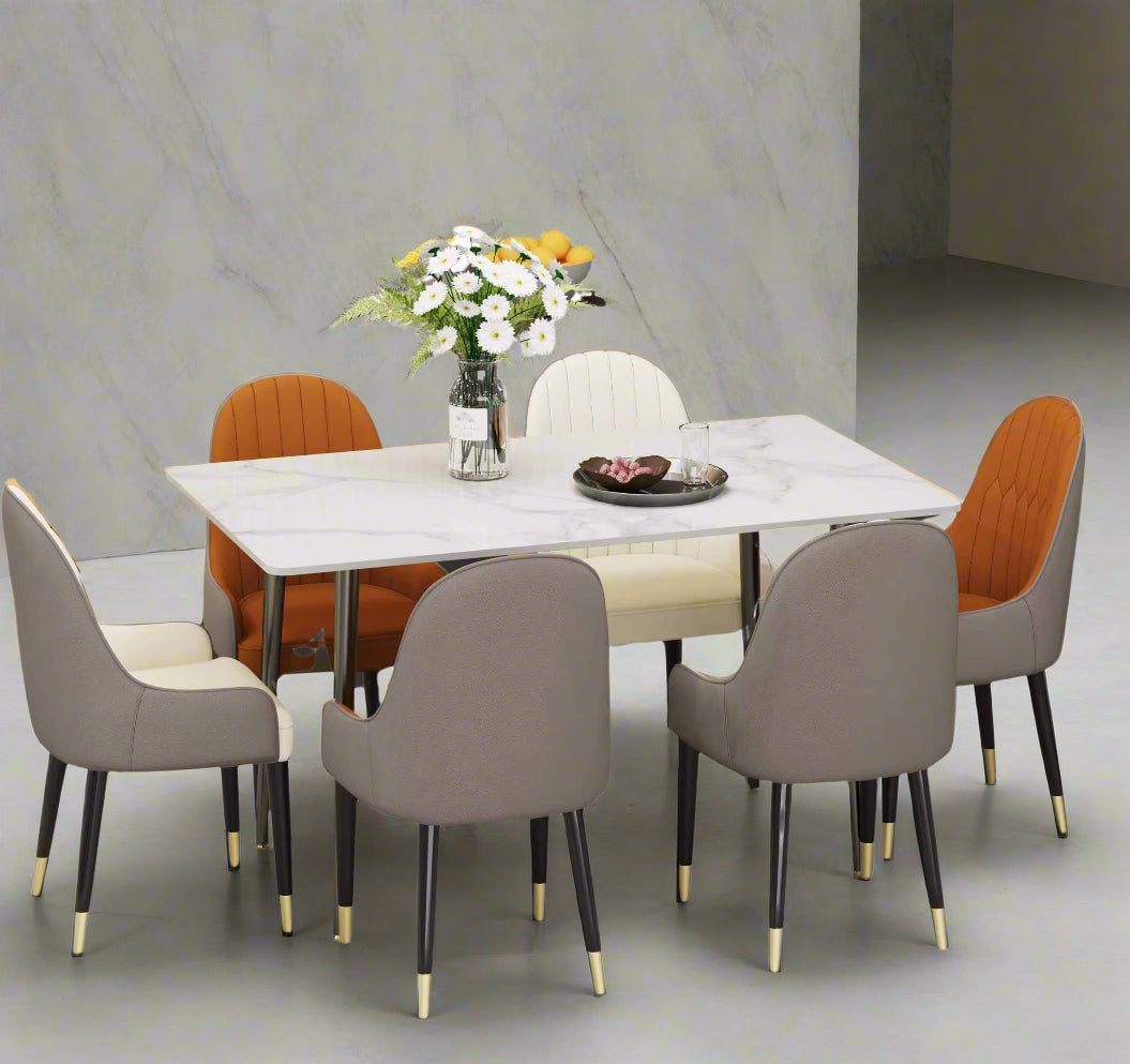 A rectangular marble cafeteria table surrounded by 6 chairs sold by WorkZen Interiors