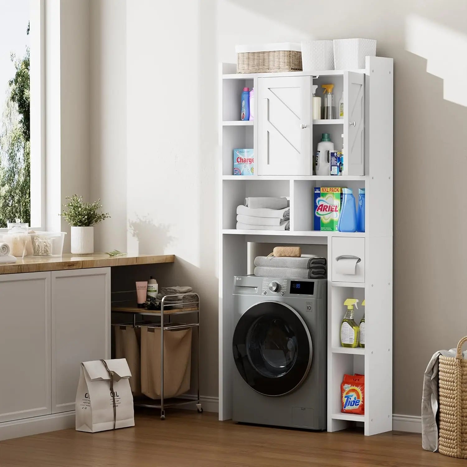 White storage cabinet with shelves next to a washing machine in a laundry room.