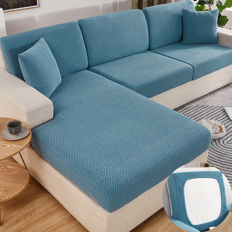 A blue Sectional Sofa Slipcovers sold by WorkZen Interiors