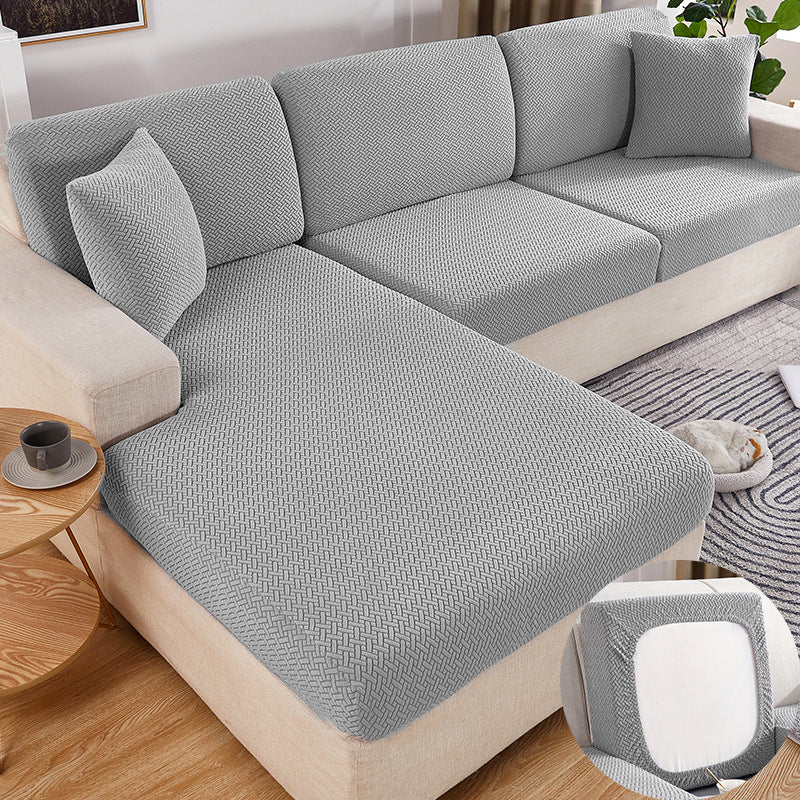 A silver Sectional Sofa Slipcovers sold by WorkZen Interiors