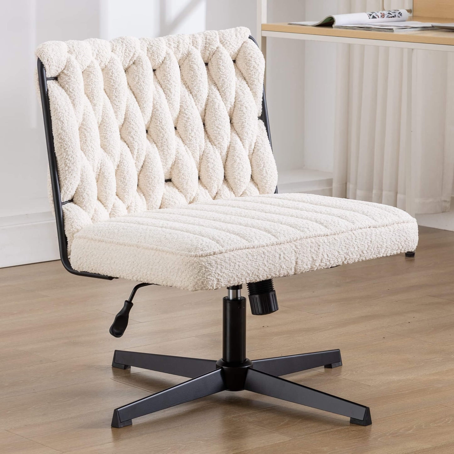 A white fabric office chair sold by WorkZen Interiors