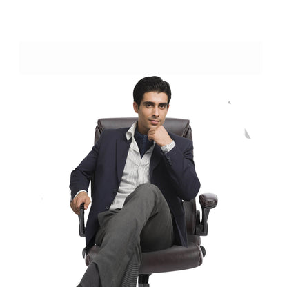 A man sitting on a leather office chair sold by WorkZen Interiors