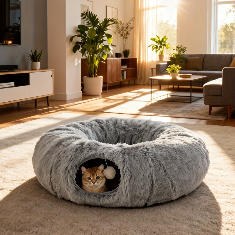 Cat lying inside a fluffy gray cat donut in a cozy living room.