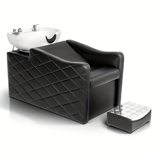 Black salon chair with white sink on a white background