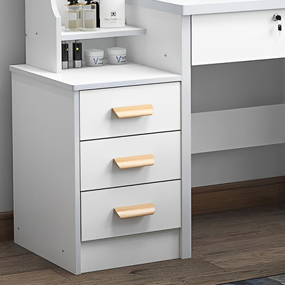 White dresser with three drawers featuring wooden handles in a room setting.