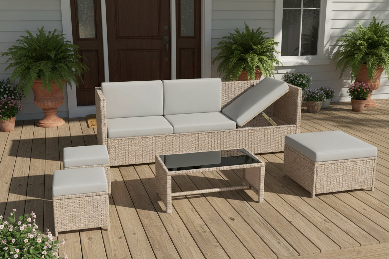 Outdoor furniture set with a sofa, ottomans, and coffee table on a white background