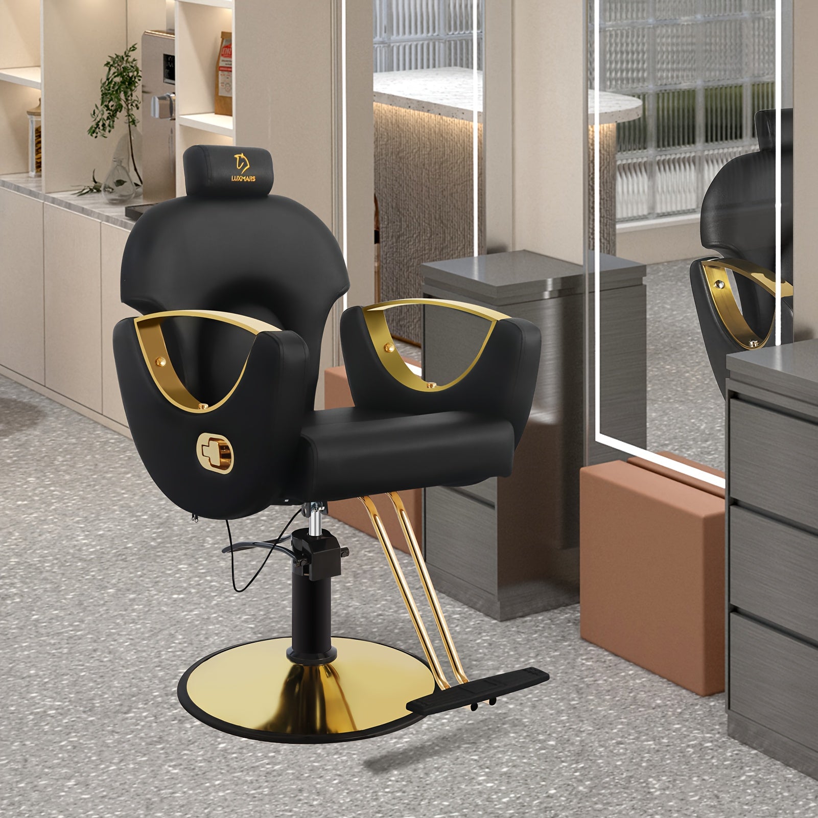 Black and gold reclining barber chair in a modern interior setting
