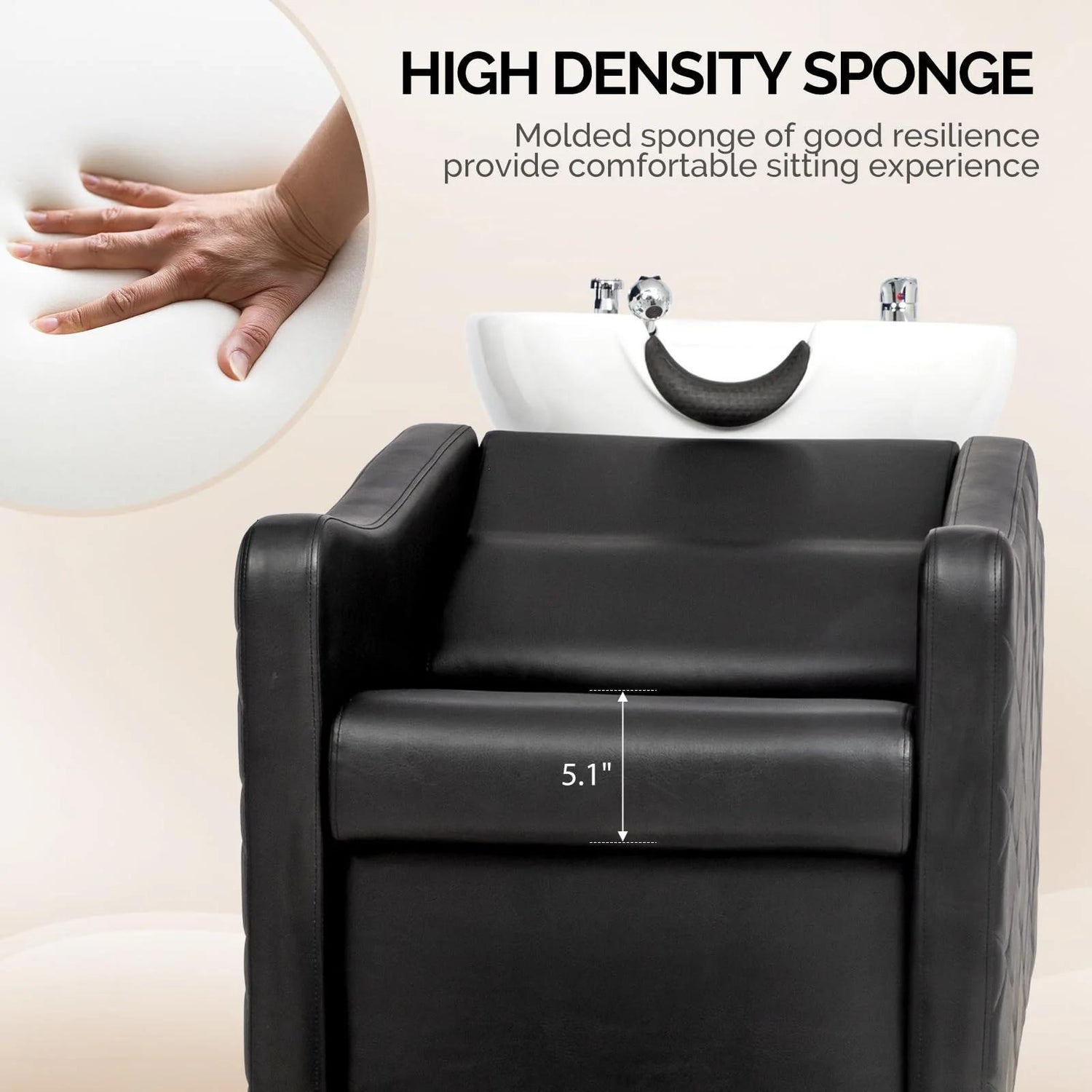 Black salon chair with a white basin and high-density sponge cushion, showing a hand for scale.