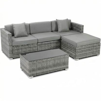 Gray outdoor sectional sofa with matching ottoman on a white background