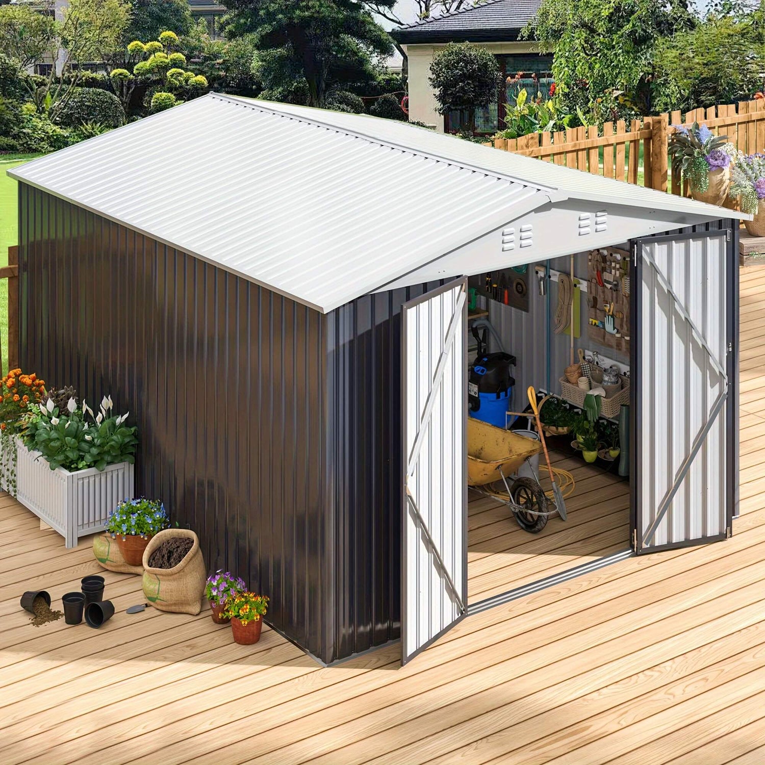 Metal garden shed with open doors on a wooden deck, surrounded by plants and garden tools.