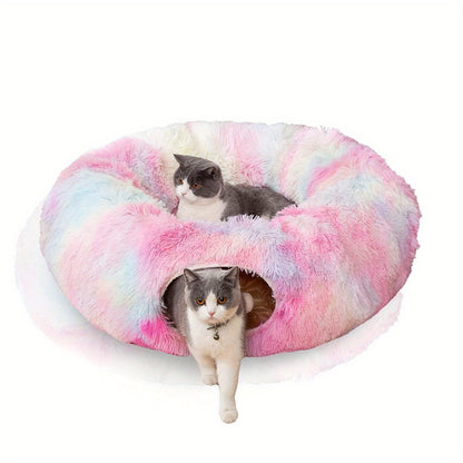 Two cats inside a colorful donut-shaped pet bed on a white background