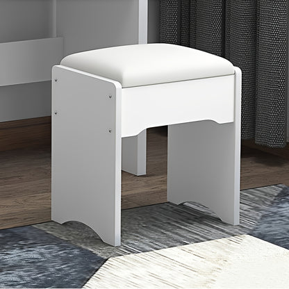 White stool with a cushioned seat in a room setting