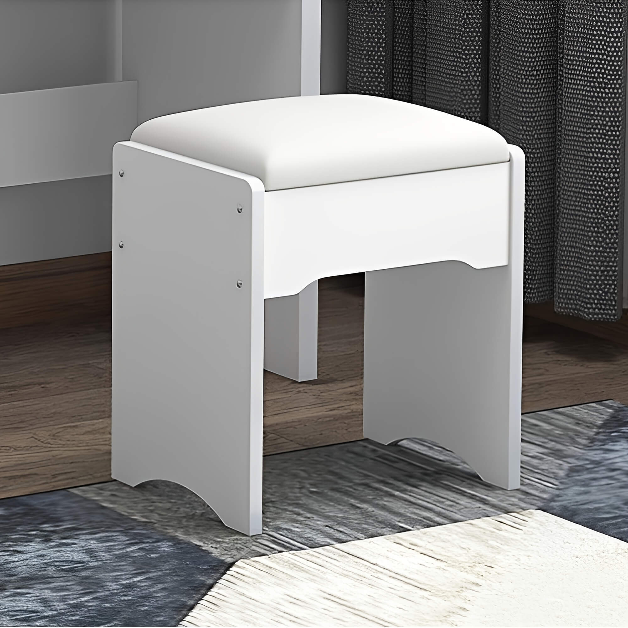 White stool with a gray base in a room setting