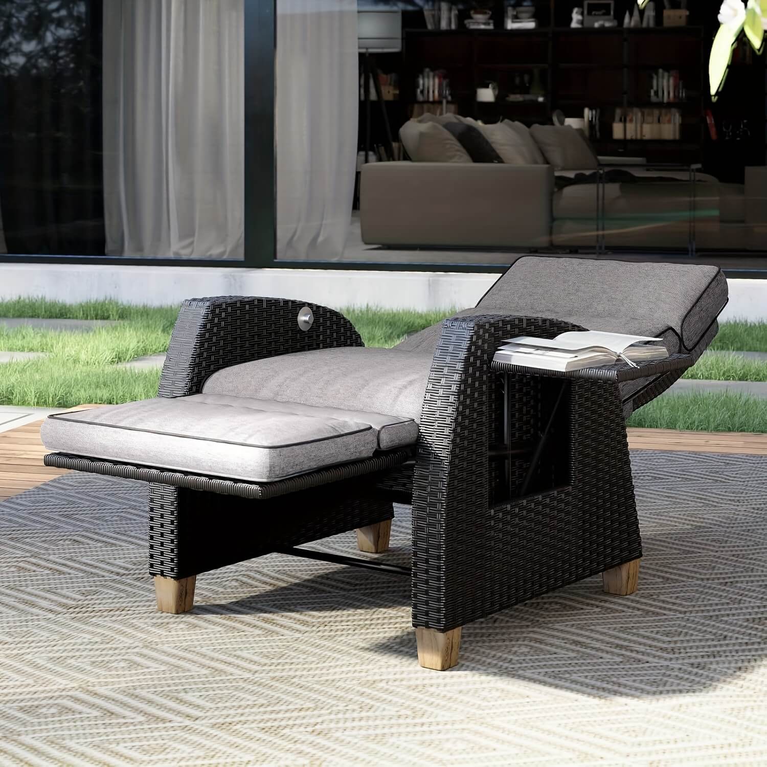 Outdoor patio furniture set with a chaise lounge on a patio.