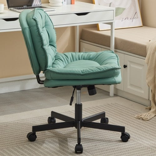 A Green armless vintage office chair used a home office 